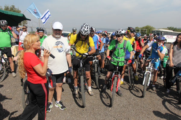 Gilad Shalit cycles with Arab and Jewish Israelis on the Cycling for Peace run.