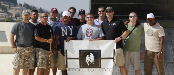 The 10 team members and two coaches of Heroes to Heroes 2012 visiting the 9/11 memorial in Jerusalem. Photo by Eilon Levy.