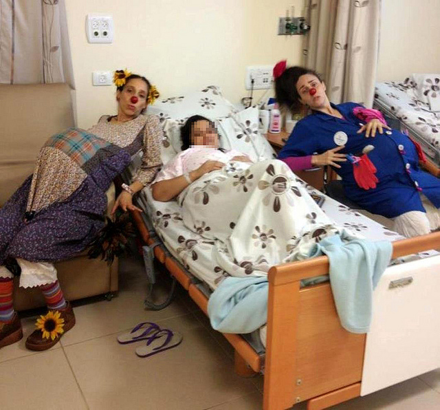 Shirley Goldstein (“Florina”) and Ayelet Shadmon (“Yula”) with a laboring mother at Poriya Hospital.