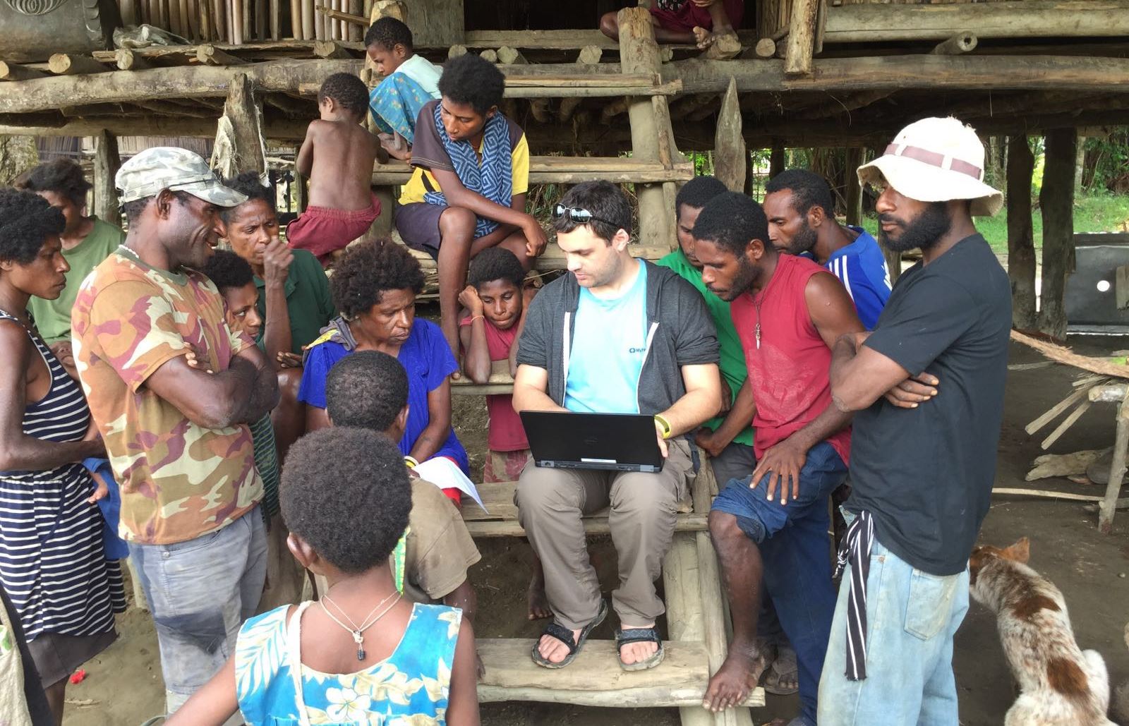 Ohad Nitzan of MyHeritage gathering genealogical information from local families in Papua, New Guinea. Photo by Golan Levi 